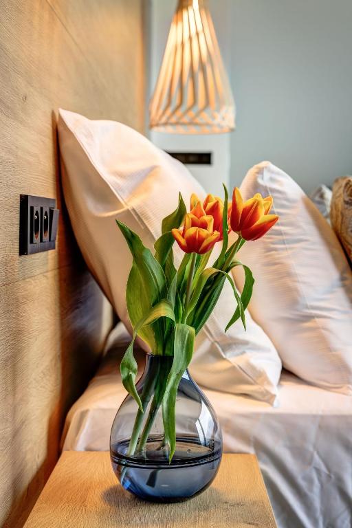 Postel nebo postele na pokoji v ubytování Hotel Maralák