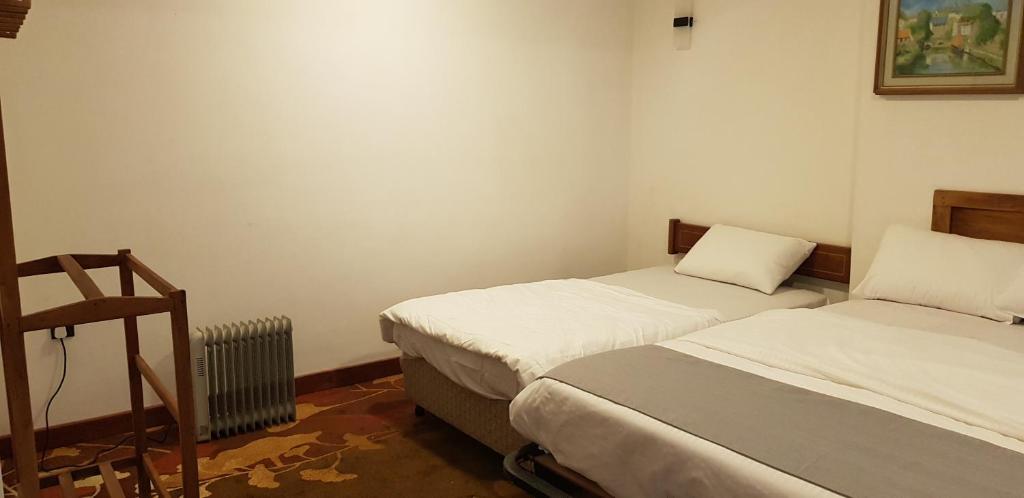Postel nebo postele na pokoji v ubytování Hotel ColdWorld