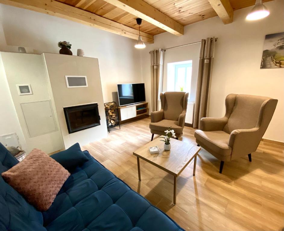 TV a/nebo společenská místnost v ubytování Apartmány Rosenberg