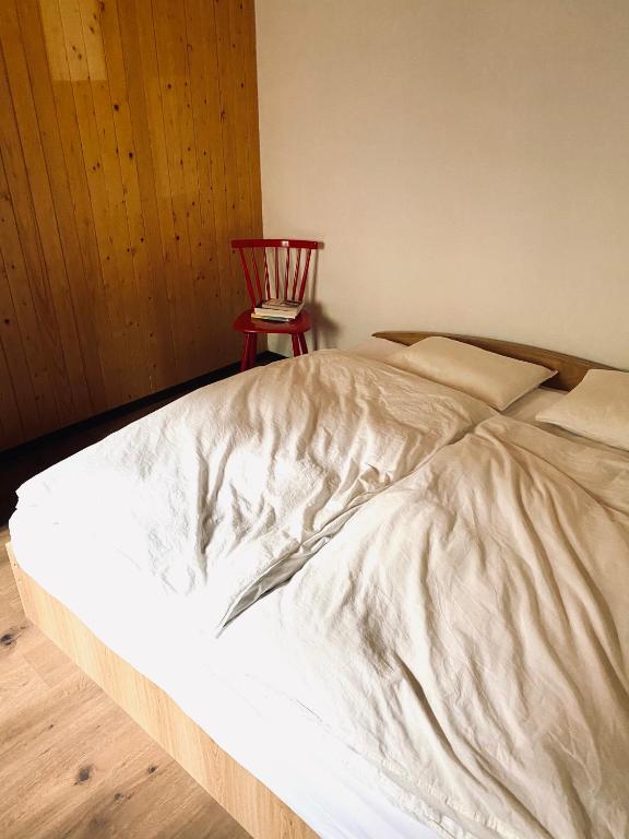 Postel nebo postele na pokoji v ubytování Chalet Amwäg