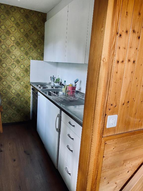Kuchyň nebo kuchyňský kout v ubytování Chalet Amwäg
