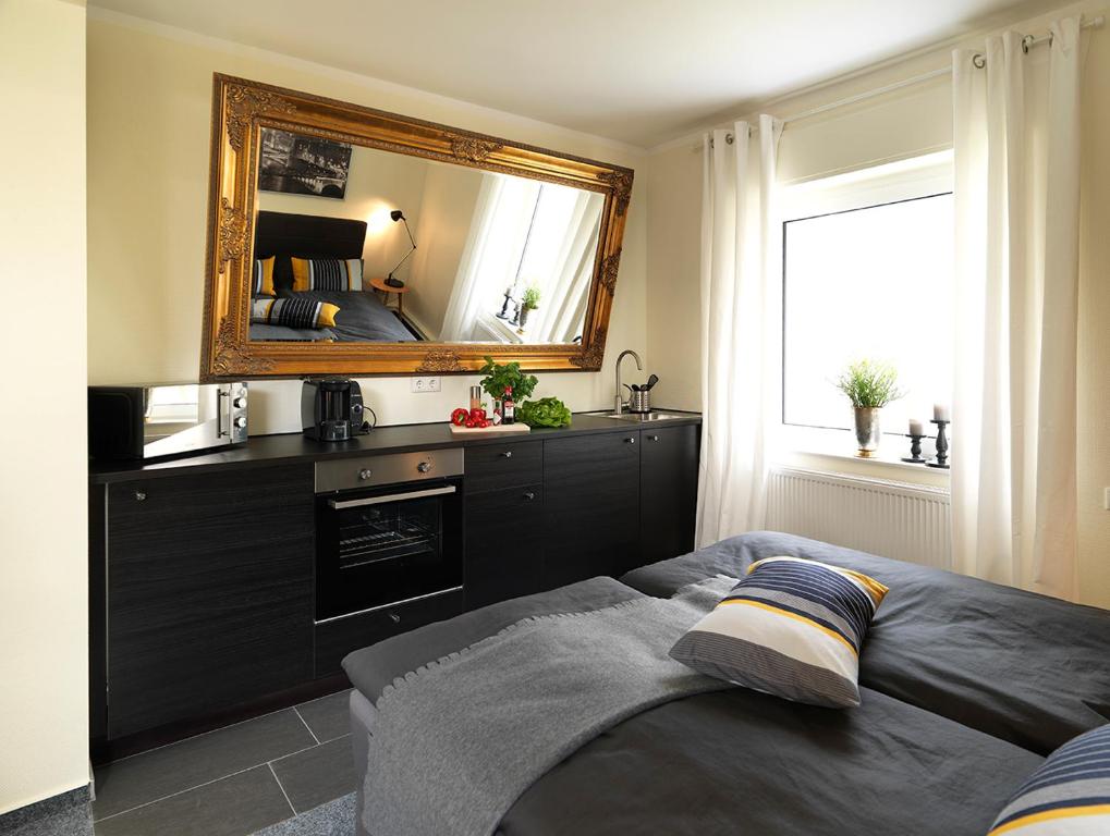 Kuchyň nebo kuchyňský kout v ubytování Soltau Apartments