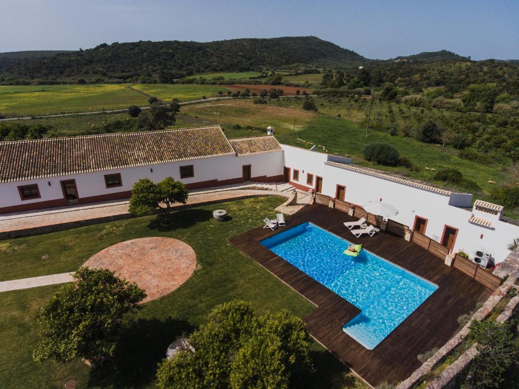 an aerial view of a villa with a swimming pool at Quinta do Freixo in Benafim