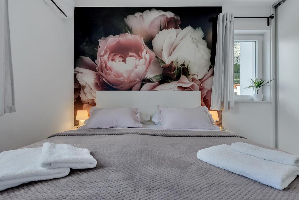 Postel nebo postele na pokoji v ubytování Studio apartmani Buljan