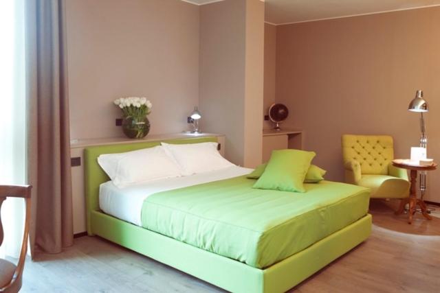Postel nebo postele na pokoji v ubytování H2C Hotel Milanofiori
