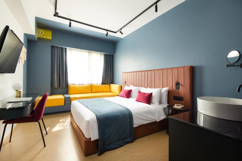 Postel nebo postele na pokoji v ubytování Colors Hotel Athens
