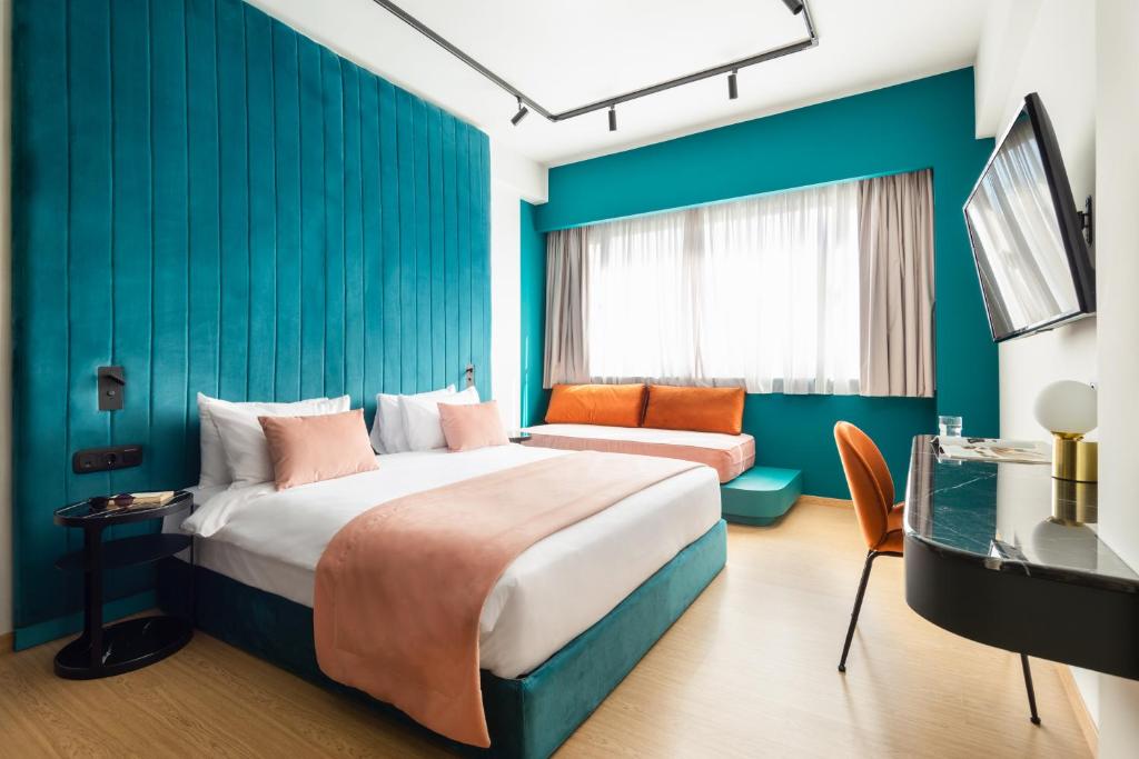Postel nebo postele na pokoji v ubytování Colors Hotel Athens
