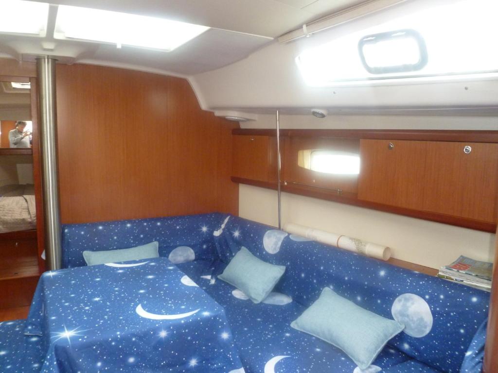 Postel nebo postele na pokoji v ubytování Le Vele Residence Sailing Boat