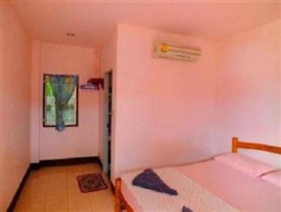 Postel nebo postele na pokoji v ubytování Tamarind Guesthouse