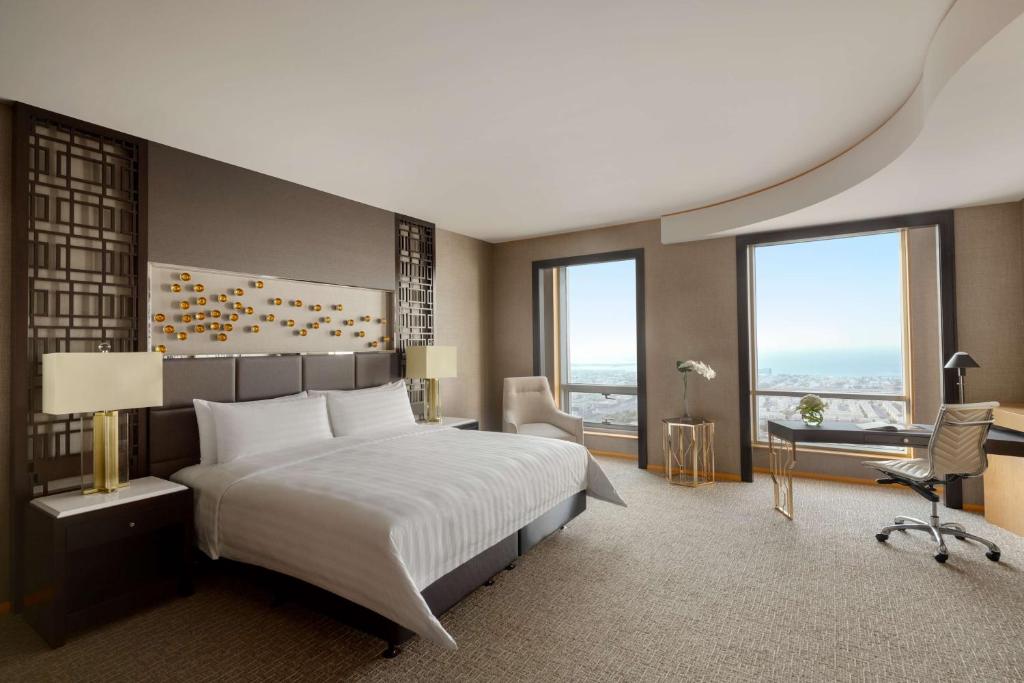 Postel nebo postele na pokoji v ubytování Shangri-La Dubai