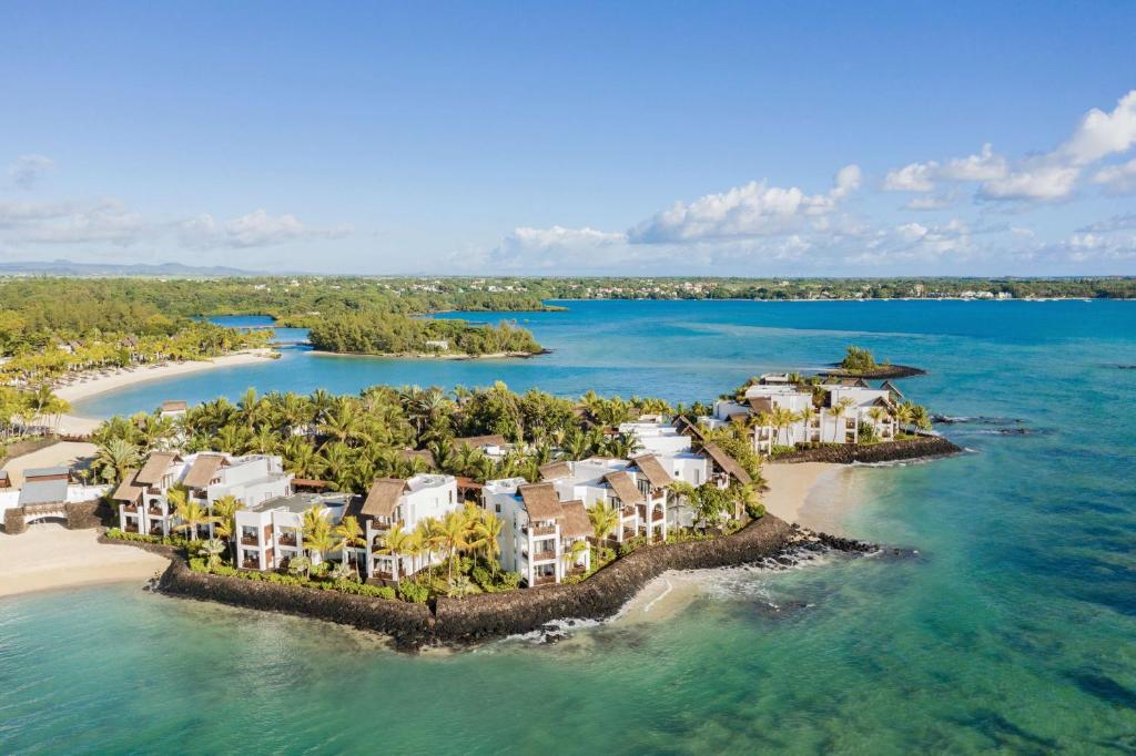 an aerial view of a resort on a beach at Shangri-La Le Touessrok, Mauritius in Trou dʼ Eau Douce