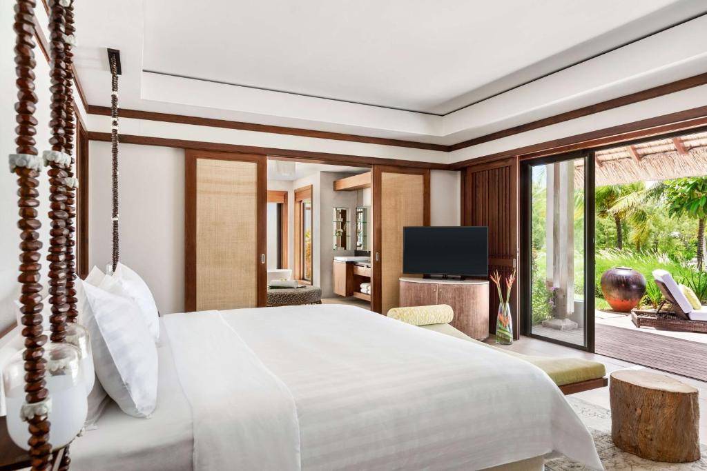 Postel nebo postele na pokoji v ubytování Shangri-La Le Touessrok, Mauritius