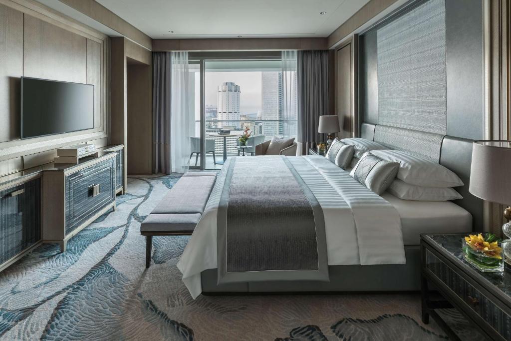 Postel nebo postele na pokoji v ubytování Shangri-La Colombo