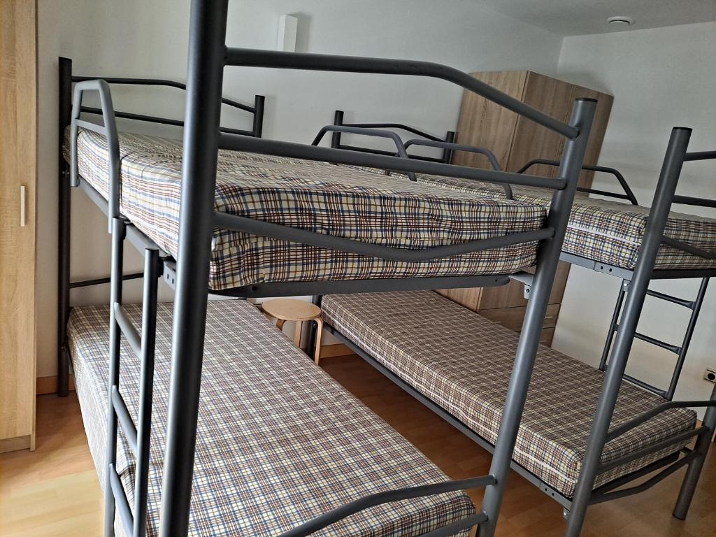 Postel nebo postele na pokoji v ubytování Albergue de Benabarre-CALUMET