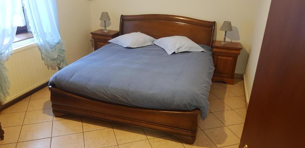 Postel nebo postele na pokoji v ubytování Gite HEINRICH