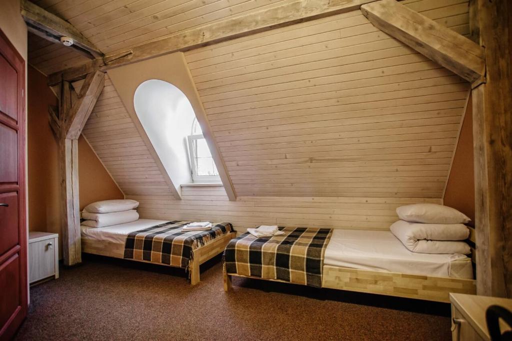 Postel nebo postele na pokoji v ubytování Guest House "Arkhistratyg"
