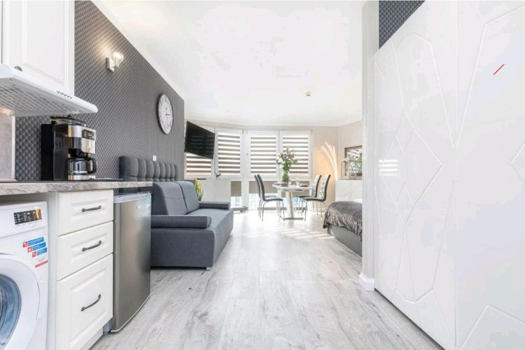 Kuchyňa alebo kuchynka v ubytovaní Flamingo ​Apartments
