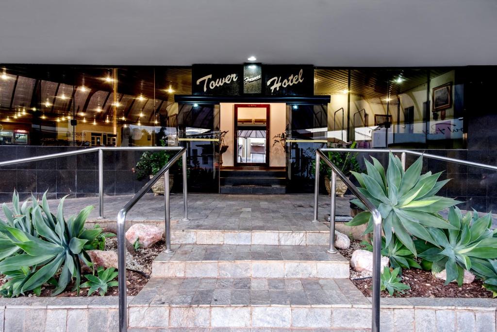 a store front with stairs in front of it at Tower Franca Hotel in Franca