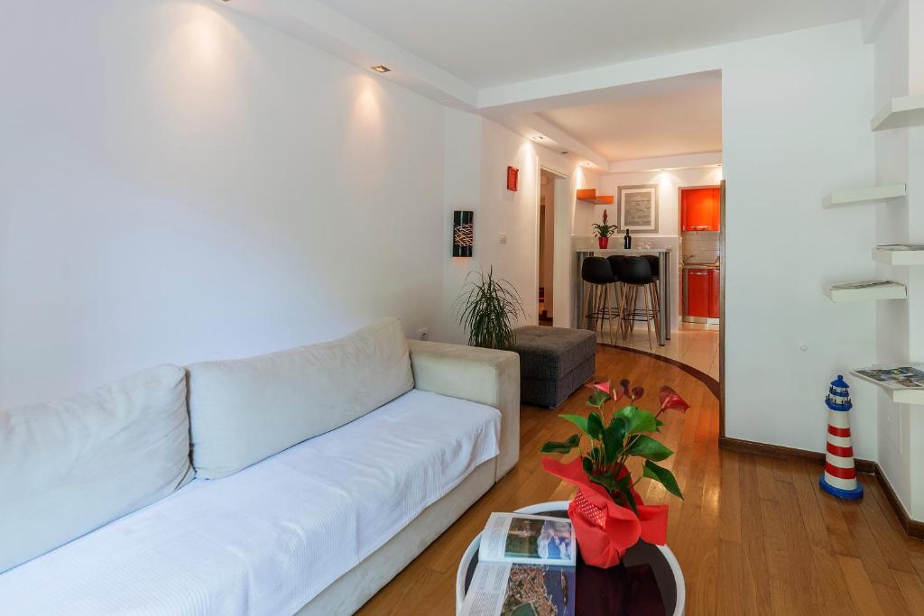 Kuchyň nebo kuchyňský kout v ubytování Apartments Villa Lungomare