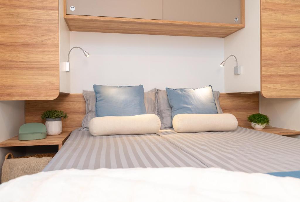 Кровать или кровати в номере Mobile Homes AZZURRO