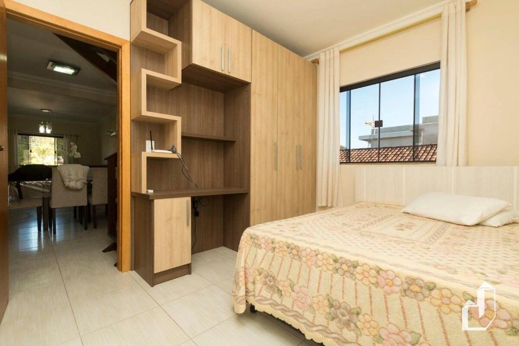  Apartamento com 03 dormitórios