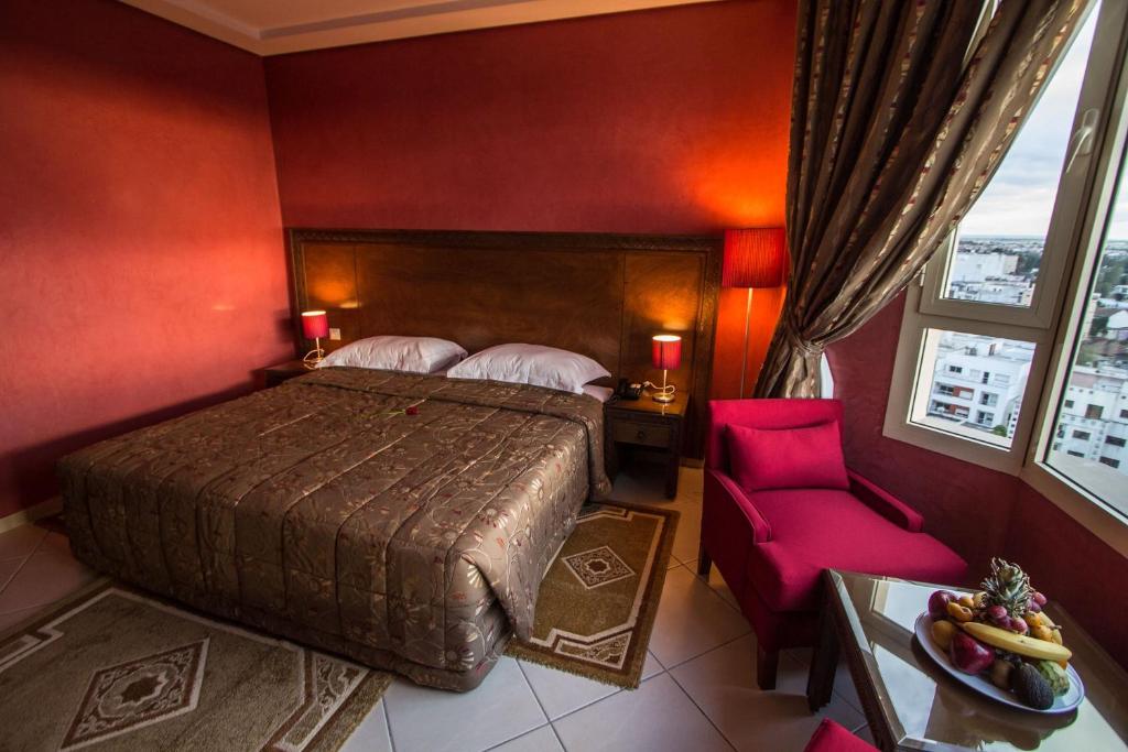 Postel nebo postele na pokoji v ubytování Hotel Tafilalet