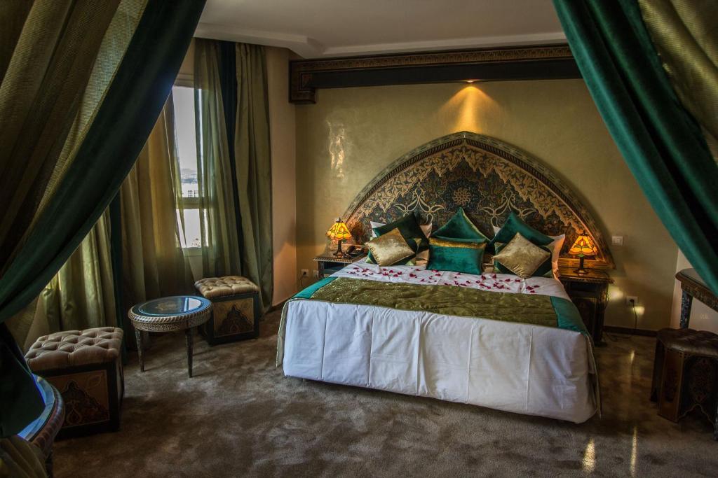 Postel nebo postele na pokoji v ubytování Hotel Tafilalet