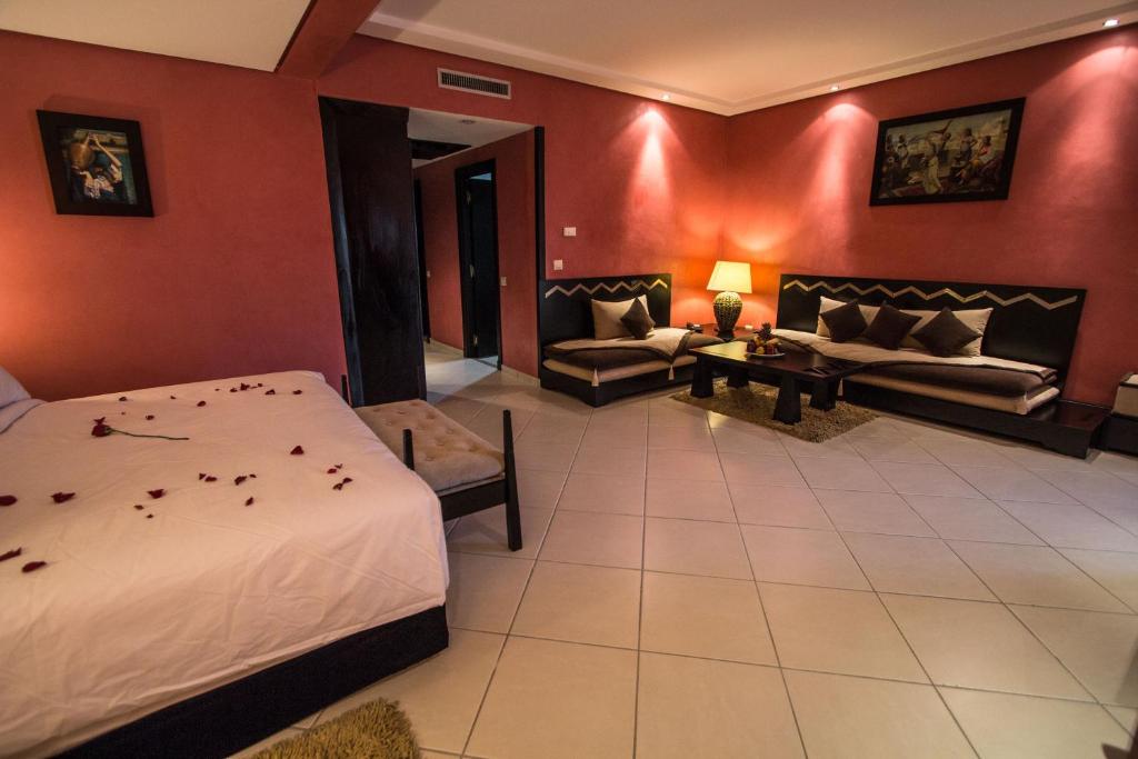 Postel nebo postele na pokoji v ubytování Hotel Tafilalet