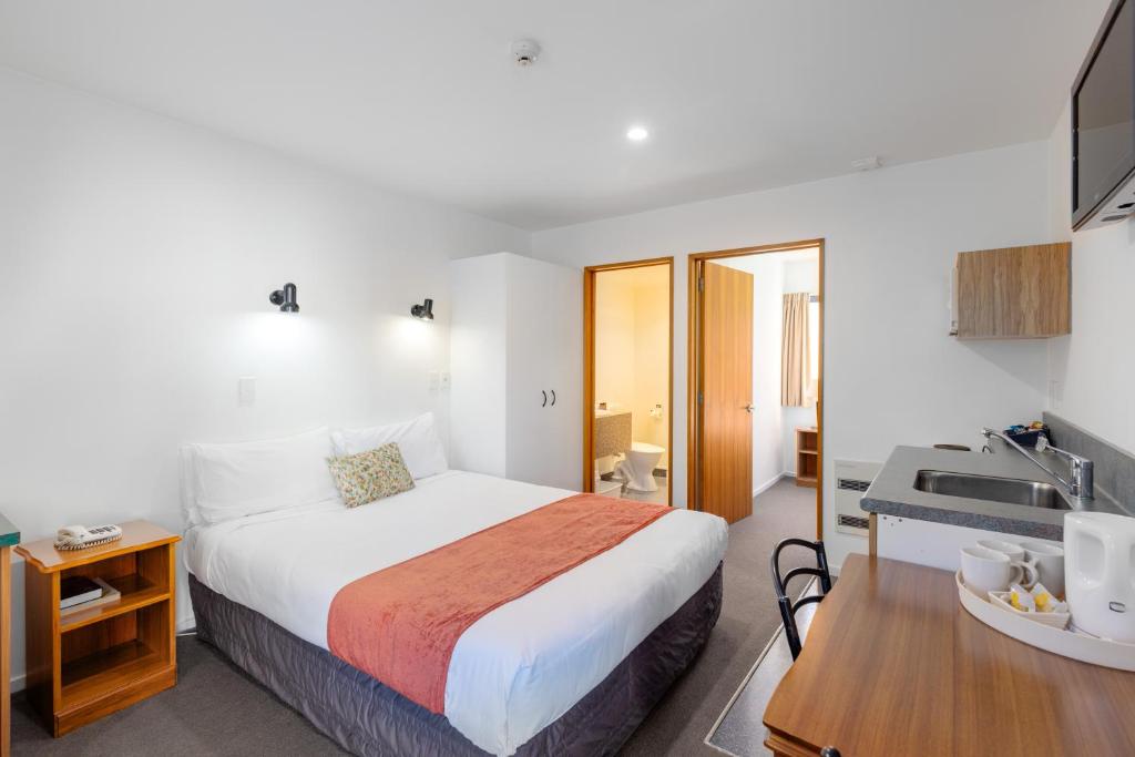 Postel nebo postele na pokoji v ubytování Bella Vista Motel & Apartments Christchurch