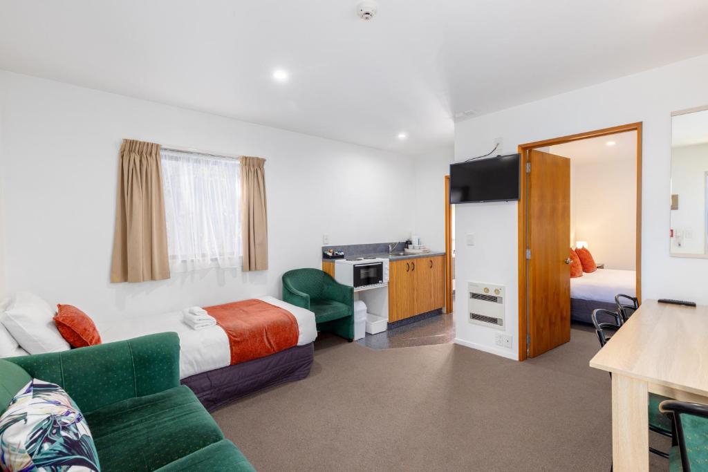 Postel nebo postele na pokoji v ubytování Bella Vista Motel & Apartments Christchurch