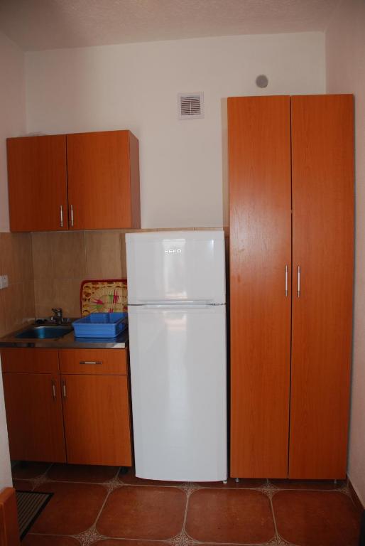 Kuchyň nebo kuchyňský kout v ubytování Guest House Nura