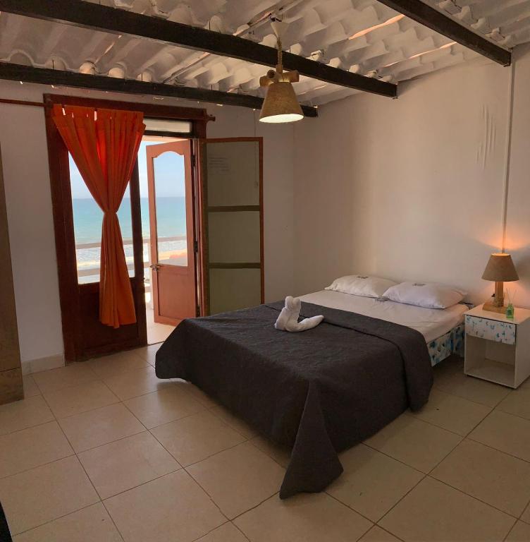 Postel nebo postele na pokoji v ubytování Hotel Luna Nueva