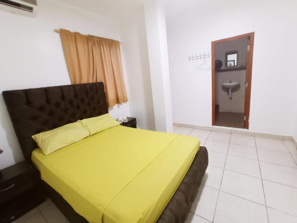 Postel nebo postele na pokoji v ubytování Hostal El Naufrago 1