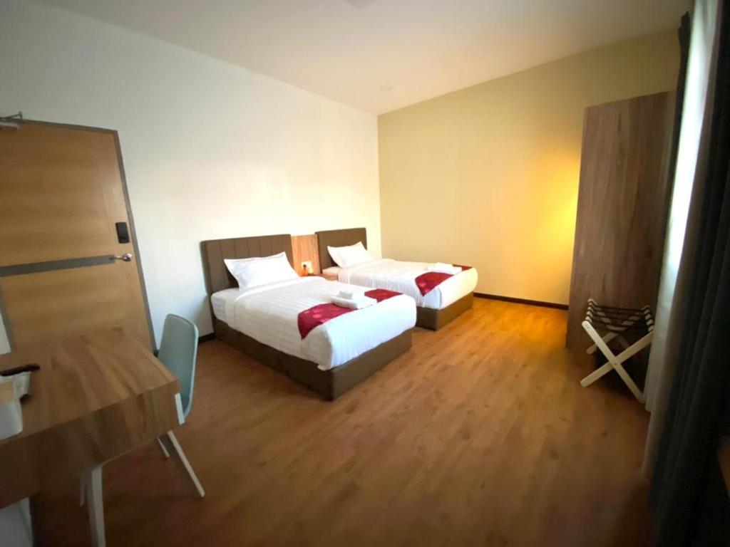 Postel nebo postele na pokoji v ubytování primaces avenue