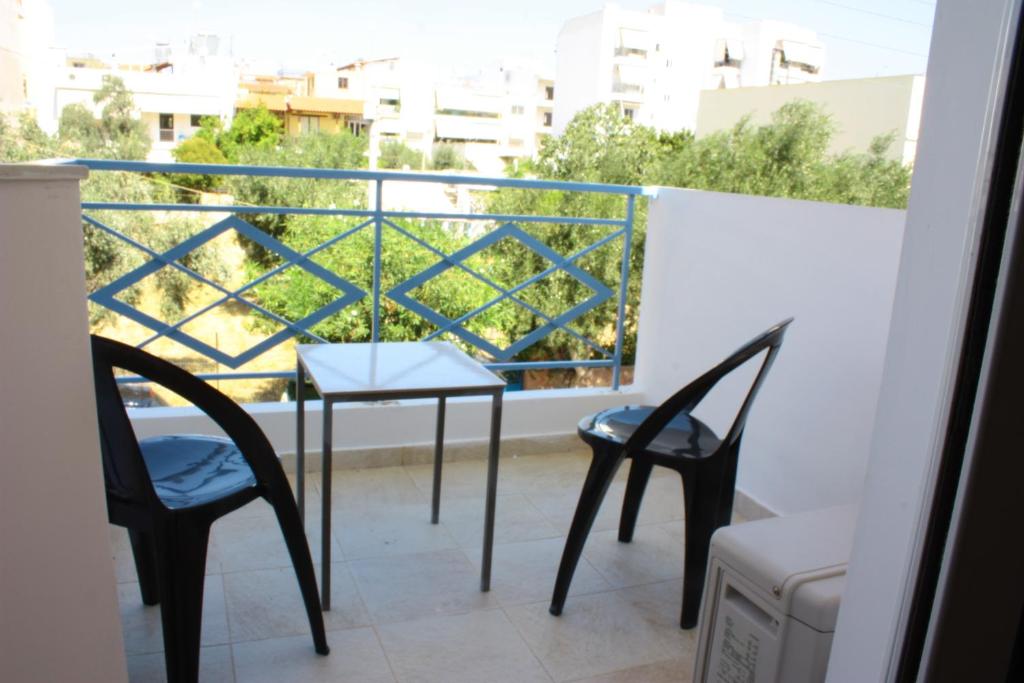 A balcony or terrace at Veggie Garden Athens B&B