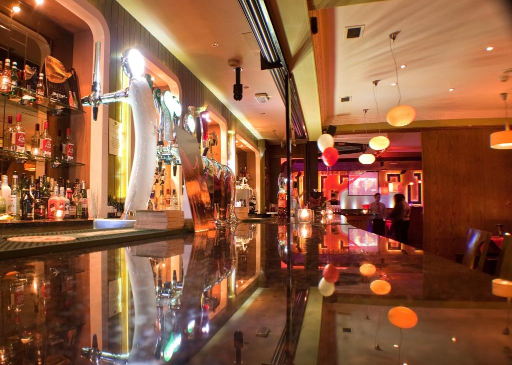 Lounge nebo bar v ubytování Ivy Tower Hotel