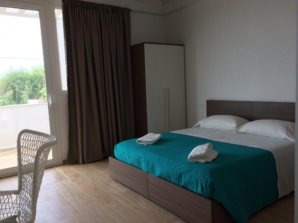 Postel nebo postele na pokoji v ubytování Saija Resort
