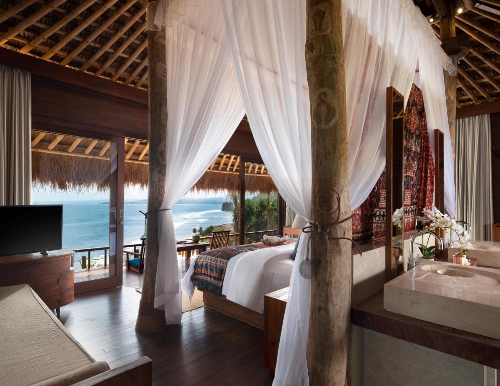 Postel nebo postele na pokoji v ubytování Lelewatu Resort Sumba