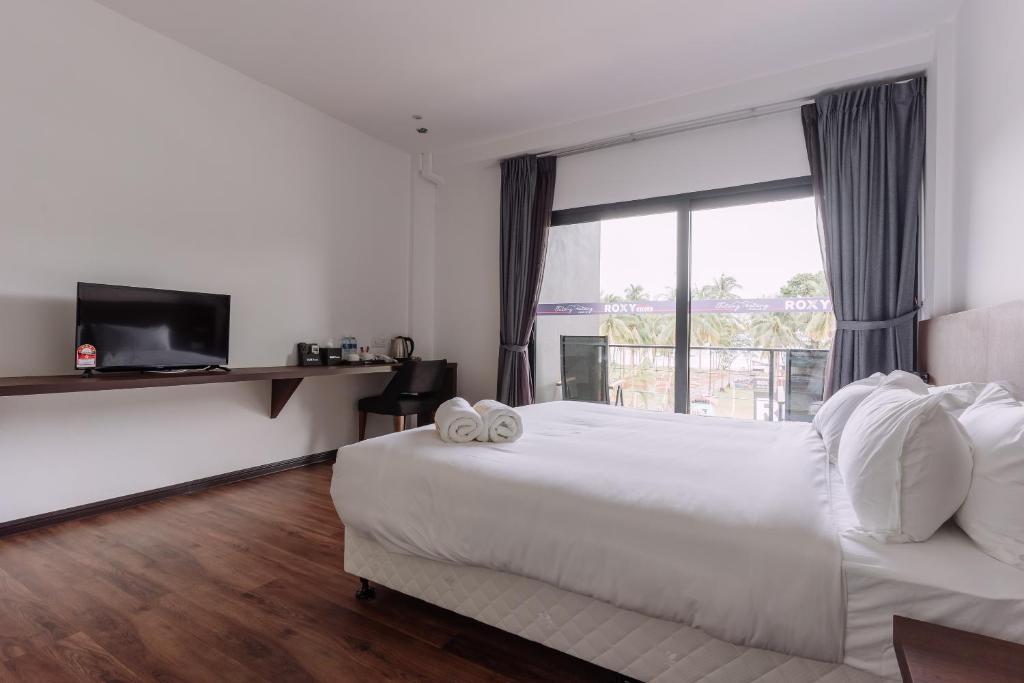 Roxy Sematan Villa & Townhouse - Deluxe King Room