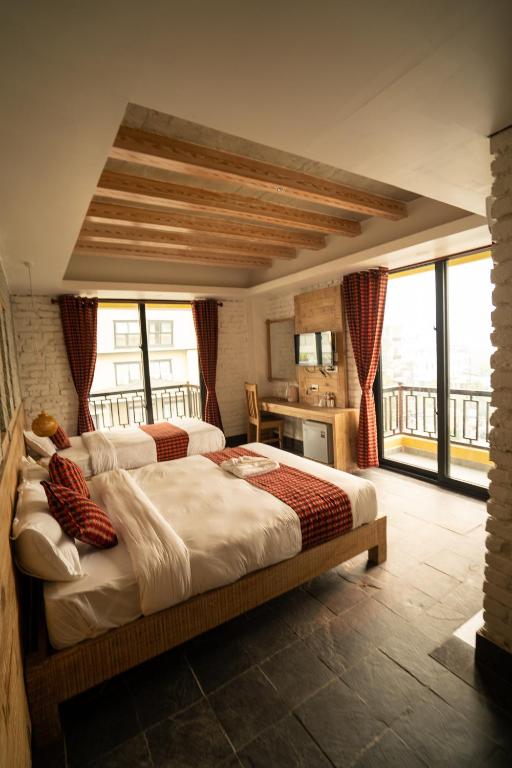 Katil atau katil-katil dalam bilik di Hotel Mera Peak Private Limited