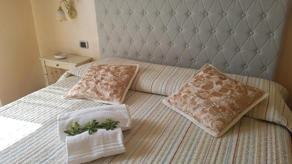 Postel nebo postele na pokoji v ubytování B&B Fontanella