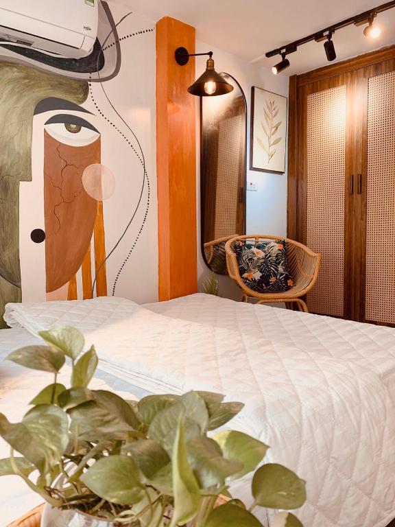 Postel nebo postele na pokoji v ubytování HnH homestay