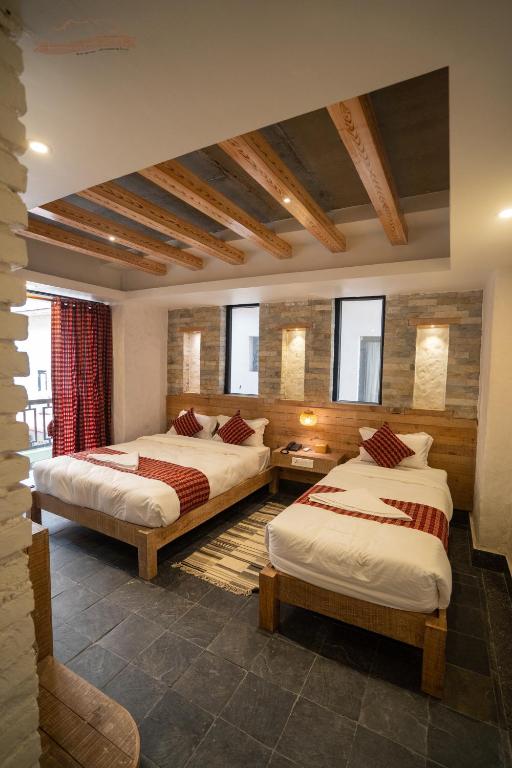 Katil atau katil-katil dalam bilik di Hotel Mera Peak Private Limited