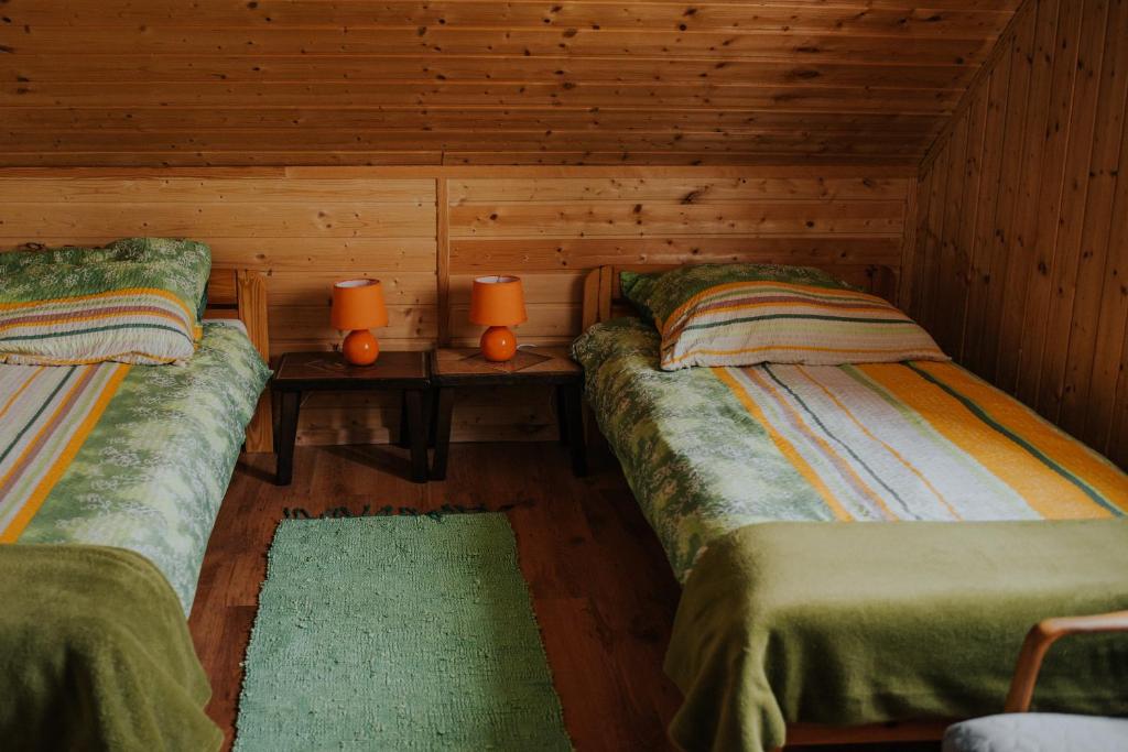 Posteľ alebo postele v izbe v ubytovaní Dom Gościnny Sowia Stópka