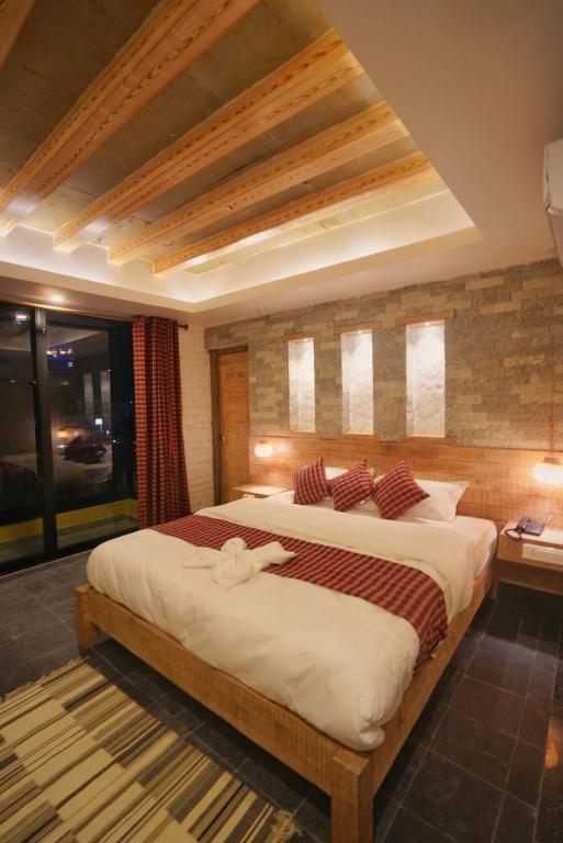 Katil atau katil-katil dalam bilik di Hotel Mera Peak Private Limited