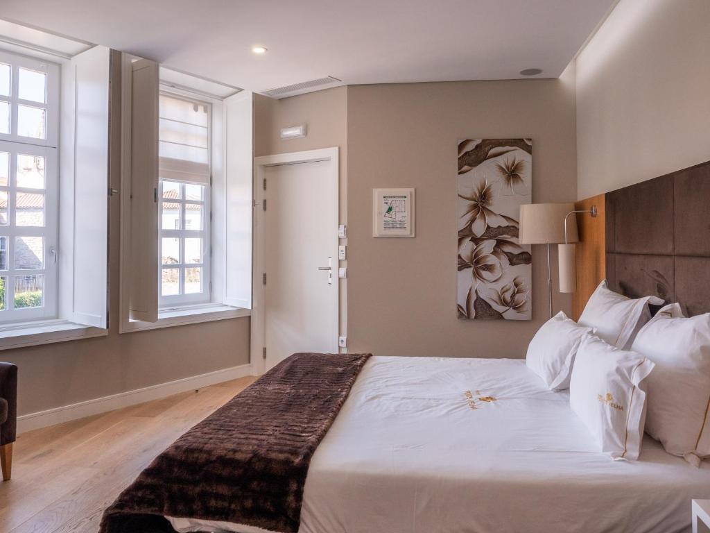 Postel nebo postele na pokoji v ubytování Hotel Fonte Velha