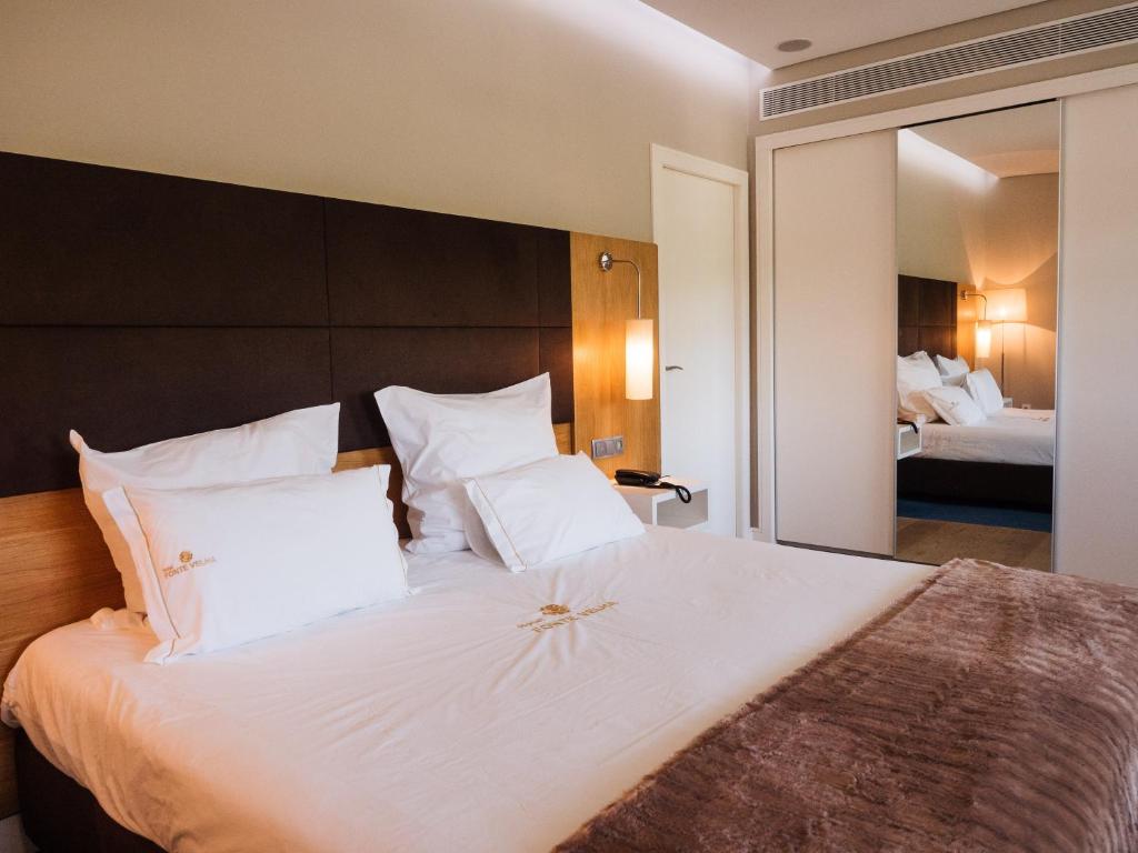 Postel nebo postele na pokoji v ubytování Hotel Fonte Velha