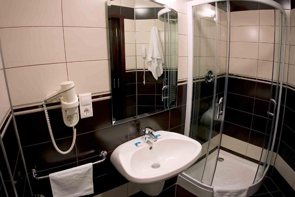 Koupelna v ubytování Hotel Astoria