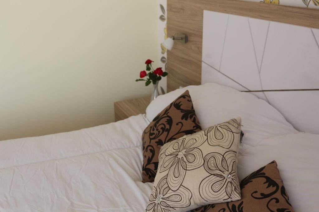 Postel nebo postele na pokoji v ubytování Vello Apartments