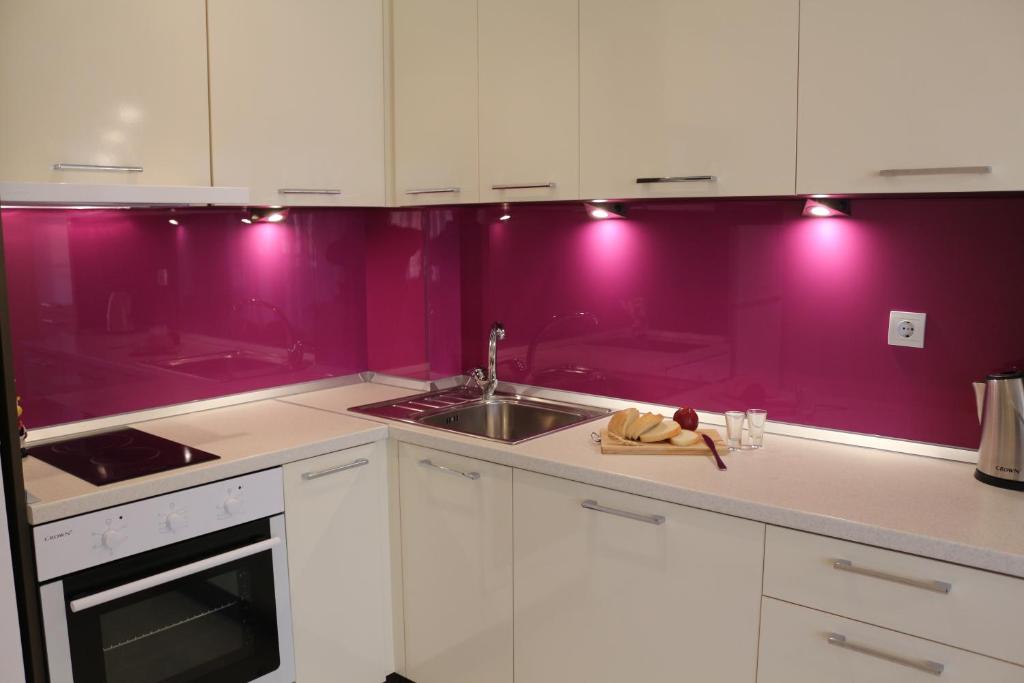 Kuchyň nebo kuchyňský kout v ubytování Vello Apartments
